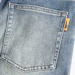 Jeansy Hugo slim fit w jasnym spranym denimie