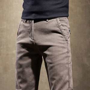 Spodnie slim fit z bawełny ze stretchem, gładkie wykończenie