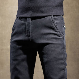 Spodnie slim fit z bawełny ze stretchem, gładkie wykończenie