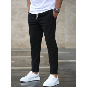 Spodnie slim fit ze sznurkiem w pasie, zwężana nogawka